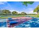 Community cornhole area with multiple boards and a large playing surface at 9109 Winter Harbour Way, Bradenton, FL 34212