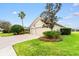 Single-Gathering home with two car garage, manicured lawn and landscaping at 9109 Winter Harbour Way, Bradenton, FL 34212