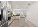 Modern kitchen with stainless steel appliances and granite countertops at 9109 Winter Harbour Way, Bradenton, FL 34212