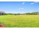 Peaceful lake view from the property's backyard at 9109 Winter Harbour Way, Bradenton, FL 34212