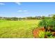 Serene view of the lake from the backyard at 9109 Winter Harbour Way, Bradenton, FL 34212