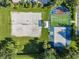 Aerial view showing sand volleyball court and bocce ball courts at 9109 Winter Harbour Way, Bradenton, FL 34212