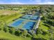 Aerial view of community tennis and pickleball courts at 9109 Winter Harbour Way, Bradenton, FL 34212