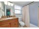 Clean bathroom with granite countertop and tub shower combo at 972 La Costa Cir # 5, Sarasota, FL 34237