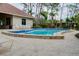 Community pool with plenty of lounge chairs for relaxing at 972 La Costa Cir # 5, Sarasota, FL 34237