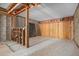 Unfinished basement with exposed framing and walls at 100 73Rd St # 104A, Holmes Beach, FL 34217