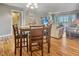 Bright dining area with light wood floors at 10190 Imperial Point W Dr # 16, Largo, FL 33774