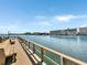 Wooden dock with benches overlooking the calm water at 10190 Imperial Point W Dr # 16, Largo, FL 33774