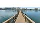 Wooden community dock extending into the water at 10190 Imperial Point W Dr # 16, Largo, FL 33774