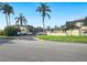 Condo building with landscaping and parking lot at 10190 Imperial Point W Dr # 16, Largo, FL 33774