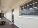 Clean condo hallway with door to unit at 10190 Imperial Point W Dr # 16, Largo, FL 33774