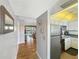 Kitchen with stainless steel appliances and wood floors at 10190 Imperial Point W Dr # 16, Largo, FL 33774