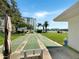 Shuffleboard courts and a bench near the water at 10190 Imperial Point W Dr # 16, Largo, FL 33774