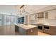 Modern kitchen with stainless steel appliances and an island at 111 S Pineapple Ave # 708, Sarasota, FL 34236