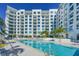 Large resort-style pool with building view at 111 S Pineapple Ave # 708, Sarasota, FL 34236