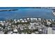 Aerial view highlighting the home's location near the water at 141 N Adams Dr, Sarasota, FL 34236