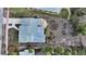 Aerial view of a home with a large backyard at 141 N Adams Dr, Sarasota, FL 34236
