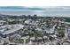 Aerial view of a house close to the beach and businesses at 141 N Adams Dr, Sarasota, FL 34236