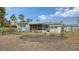 Charming home with screened porch, patio, and large backyard at 141 N Adams Dr, Sarasota, FL 34236