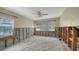 Needs renovation: Bedroom with hardwood floors and window at 141 N Adams Dr, Sarasota, FL 34236