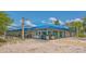 Covered picnic area with grills and outdoor seating at 141 N Adams Dr, Sarasota, FL 34236