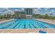 Large community pool with lap lanes and lounge chairs at 141 N Adams Dr, Sarasota, FL 34236