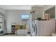 Laundry room with washer and dryer, good storage at 141 N Adams Dr, Sarasota, FL 34236