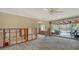 Renovation project: Living room with hardwood floors and fireplace at 141 N Adams Dr, Sarasota, FL 34236