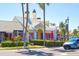 Le Macaron and other shops on a street at 141 N Adams Dr, Sarasota, FL 34236