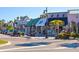 Mini Donuts and other shops on a street at 141 N Adams Dr, Sarasota, FL 34236