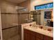 Elegant bathroom with double vanity, large shower, and updated fixtures at 1507 Water Oak Way S, Bradenton, FL 34209