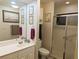 Clean bathroom with shower, single vanity, and mirror at 1507 Water Oak Way S, Bradenton, FL 34209