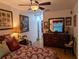 Spacious bedroom with dresser and access to another room at 1507 Water Oak Way S, Bradenton, FL 34209