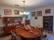 Round dining table with mid century modern hutch and buffet at 1507 Water Oak Way S, Bradenton, FL 34209