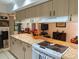 Spacious kitchen featuring granite countertops and ample cabinetry at 1507 Water Oak Way S, Bradenton, FL 34209