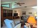 Open living room with wood built-ins and a vaulted ceiling at 1507 Water Oak Way S, Bradenton, FL 34209