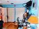 Home office with built-in shelving and a comfortable chair at 1507 Water Oak Way S, Bradenton, FL 34209