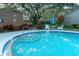Community pool with ample deck space for relaxing at 1507 Water Oak Way S, Bradenton, FL 34209