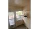 Small laundry area with exterior access at 175 Island Cir, Sarasota, FL 34242