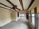 Spacious living area with wood beam ceilings at 175 Island Cir, Sarasota, FL 34242