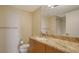 Bathroom with granite countertop and modern vanity at 1945 Gulf Of Mexico Dr # M2-313, Longboat Key, FL 34228