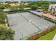 Aerial view of community tennis courts at 1945 Gulf Of Mexico Dr # M2-313, Longboat Key, FL 34228