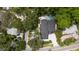 An aerial view showcasing the home's location, landscaping, and a pool at 2174 Mcclellan Pkwy, Sarasota, FL 34239