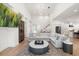 Spacious living room with large sectional sofa and high ceilings at 2174 Mcclellan Pkwy, Sarasota, FL 34239