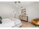 Main bedroom with a dresser and a yellow accent chair at 2174 Mcclellan Pkwy, Sarasota, FL 34239