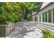 Private pool with brick patio, outdoor kitchen, and lush landscaping at 2174 Mcclellan Pkwy, Sarasota, FL 34239