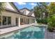 Inviting swimming pool with spacious patio and home view at 2174 Mcclellan Pkwy, Sarasota, FL 34239
