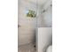 Walk-in shower with modern tile and glass at 2174 Mcclellan Pkwy, Sarasota, FL 34239