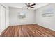 Well-lit bedroom with wood-look floors and ample closet space at 2410 33Rd W St, Bradenton, FL 34205