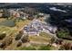 Community clubhouse with golf course and landscaped grounds at 2611 Little Country Rd, Parrish, FL 34219
